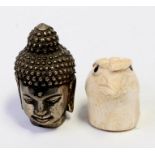 A carved bone walking cane handle in the form of a birds head, together with a white metal Buddha'