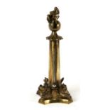 A Grand tour style 19th century desk top thermometer with dolphin supports, surmounted a