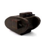 A large trench art wooden WW1 Tank money box mounted on wooden roller wheels. Overall length