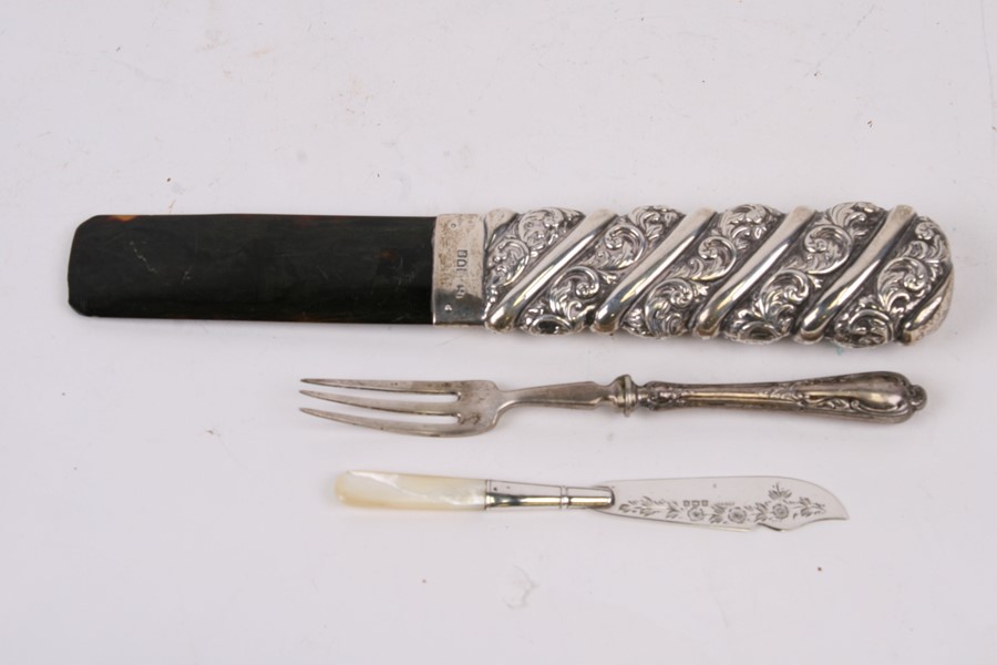 An Edwardian silver handled tortoiseshell page turner, London 1906, together with a silver butter