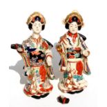 A pair of 19th century Japanese Satsuma figures of Bijan ladies, 19cms (7.5ins) high (2).Condition