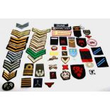 A large quantity of assorted mainly Military cloth badges (approx. 50)
