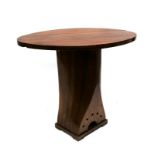 An unusual occasional table made from a laminated mahogany propeller, 90cm (35.5ins ) wide.