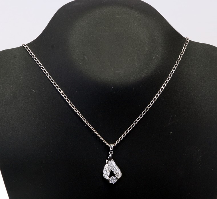 A silver pendent and chain by Elanza