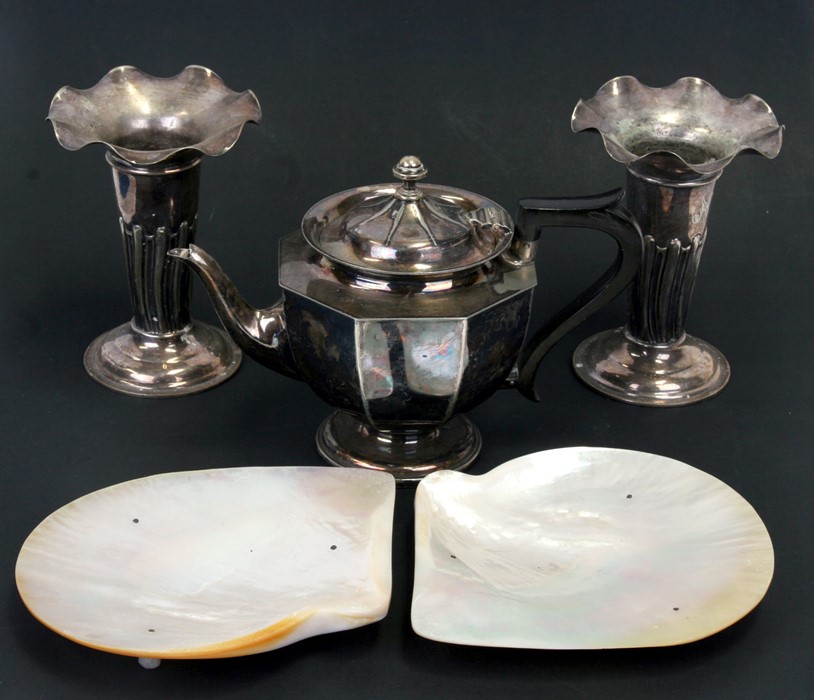 A pair of silver plated vases, a silver plated teapot together with two mother of pearl dishes,