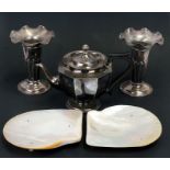A pair of silver plated vases, a silver plated teapot together with two mother of pearl dishes,
