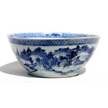 A Chinese large blue & white bowl decorated with a mountainous landscape scene, 36cms (14ins)