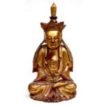 A large Chinese gilded wooden figure seated in meditation, 32cms (12.5ins) high.Condition