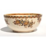 A Japanese Satsuma bowl and over with gilt character mark to the underside, 11cms (4.4ins) wide.