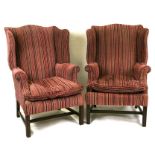 A pair of wing back armchairs on square legs.Condition Reportheight 113cm width 77cm height to