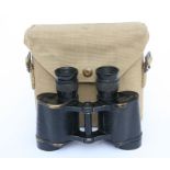 A pair of WWII Taylor-Hobson no. 2 mark III field glasses in canvas bag.