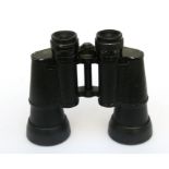 A pair of Nippon Kogaku Nikon Featherweight 7x50 binoculars, number 157192.