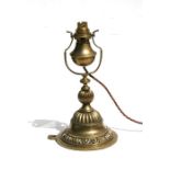 A brass Gimble lamp, 29cms (11.5ins) high.