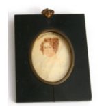 A 19th century portrait miniature of a young lady, 6 by 7.5cms (2.25 by 3ins).