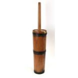 An iron bound pine butter churn, 72cms (28.5ins) high.