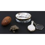 An 18th century French enamel snuff box; together with a mother of pearl silver eye glass; a