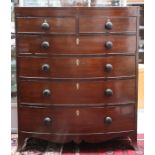 A Regency mahogany chest of two short and four long graduated drawers, on splayed bracket feet,