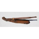 An African tribal hardwood hand hoe, 64cms (25ins) long.
