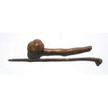 A large rootwood shillelagh, 56cms (22ins) long; together with a hazel rootwood walking stick (2).