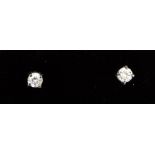 A pair of 18ct white gold diamond stud earrings.