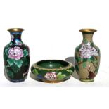 Two Chinese cloisonne vases decorated with flowers, 21cms (9.25ins) high; together with a similar