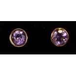 A pair of 9ct gold amethyst stud earring.