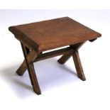 A pine & oak occasional table on an 'X' frame support, 52cms (20.5ins) wide.