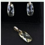 A 9ct gold diamond set faceted green quartz pendant and earrings set.
