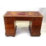 A late 19th century oak pedestal desk with an arrangement of nine drawers, on a plinth base,