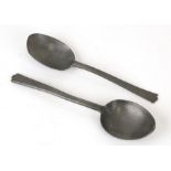 A pair of 18th century pewter trefoil spoons, the largest 17.5cms (8.25ins) long (2).