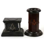 A Masonic mahogany desk tidy of octagonal form with applied Masonic emblems, 18cms (7ins) high;