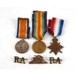 A WW1 medal trio named to 1827 Gunner EC Edwards RFA on the 1915 Star, 1827 Driver EC Edwards RA