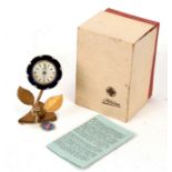 A novelty Kaiser clock in the form of a flower, with original box and instructions, 10cms (4ins)