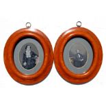 A fine quality pair of 19th century oval fruitwood picture frames set with a pair of ambrotype