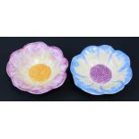 A pair of Clarice Cliff Newport Pottery flower form pin dishes, 13cms (5ins) diameter (2).