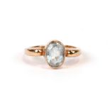 An 18ct gold and aquamarine ring set with a large oval cut aquamarine (1.62 carat), approx UK