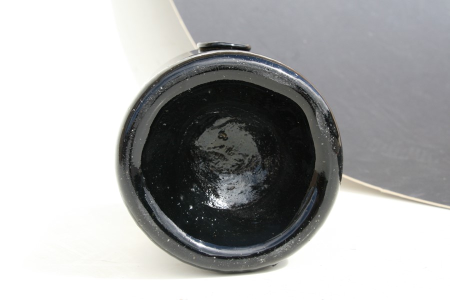 An 18th century dark amber glass seal bottle, initialled 'IN' and dated 1772, 23cms (9ins) high. - Image 3 of 7