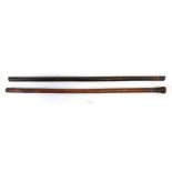 Two leather covered Military swagger sticks. Average length 61cms (24ins)