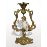 A continental brass and porcelain figural table lamp. 31cm (12.25 ins) highCondition ReportGood