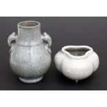 A Chinese grey crackle glaze two-handled vase, 13cms (5ins) high; together with a Chinese crackle