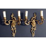 A pair of twin-arm wall sconces, 31cms (12.25ins) high (2).