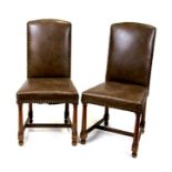 A pair of upholstered occasional chairs on turned oak legs (2).