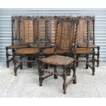 A set of six stained walnut barleytwist dining chairs with caned seats and backs (6).