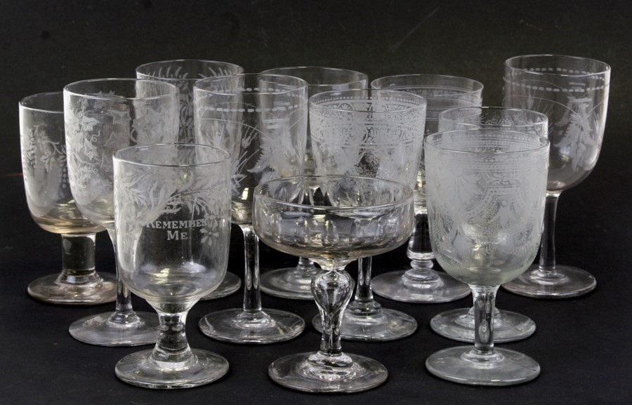 A group of 18th and 19th century wine glasses, mostly with etched decoration; together with a set of