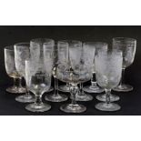 A group of 18th and 19th century wine glasses, mostly with etched decoration; together with a set of