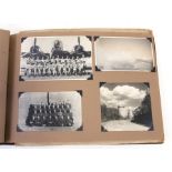 A WWII RAF photograph album including North African scenes and photos of bomb damage.