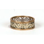 A 9ct gold ring with pierced band, approx UK size 'M'. 3.5g