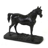 A Victorian cast iron figure of a horse, 20cms (8ins) high.