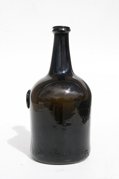 An 18th century dark amber glass seal bottle, initialled 'IN' and dated 1772, 23cms (9ins) high. - Image 6 of 7