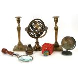 A vintage German world globe, 15cms (6ins) high; together with a novelty globe pencil sharpener, a